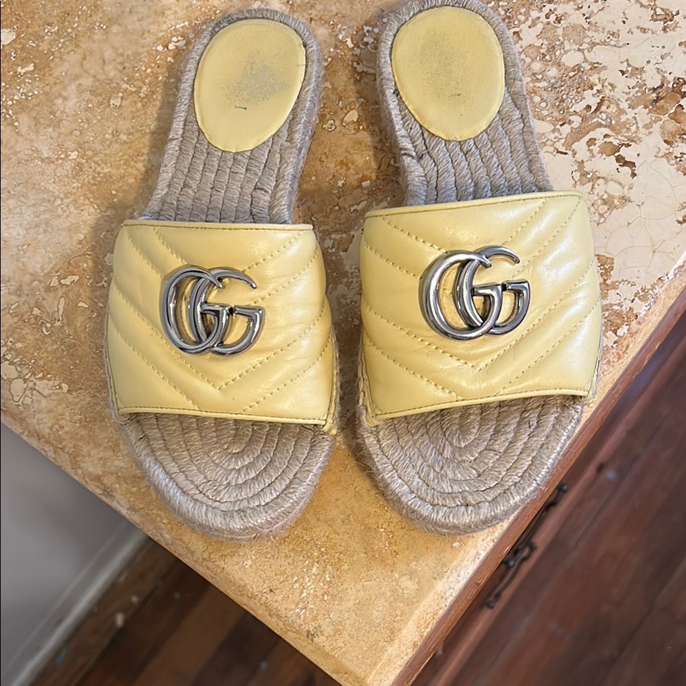 Gucci Yellow Quilted Slide Sandals.